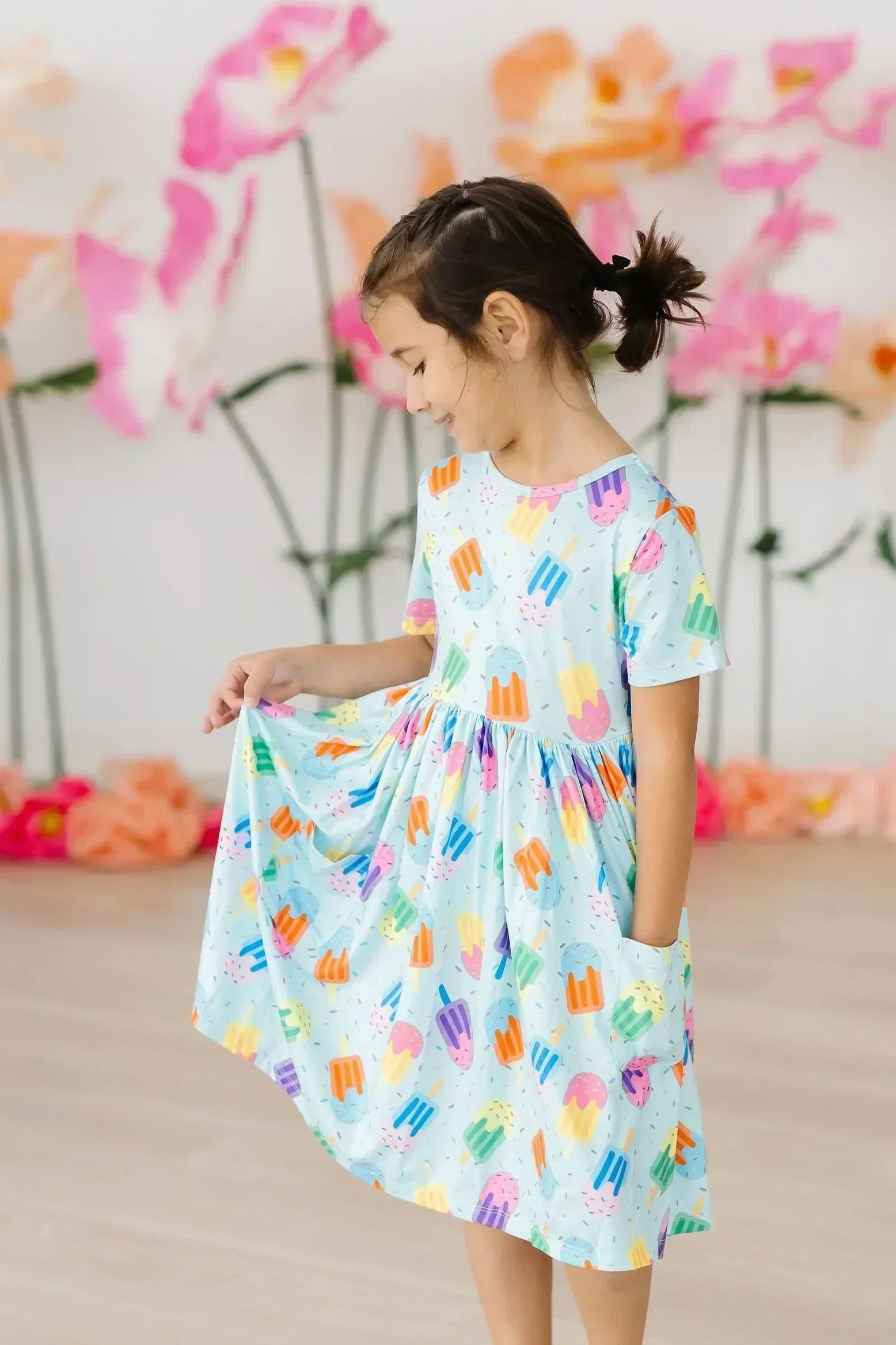 Girl in ice cream dress with pockets