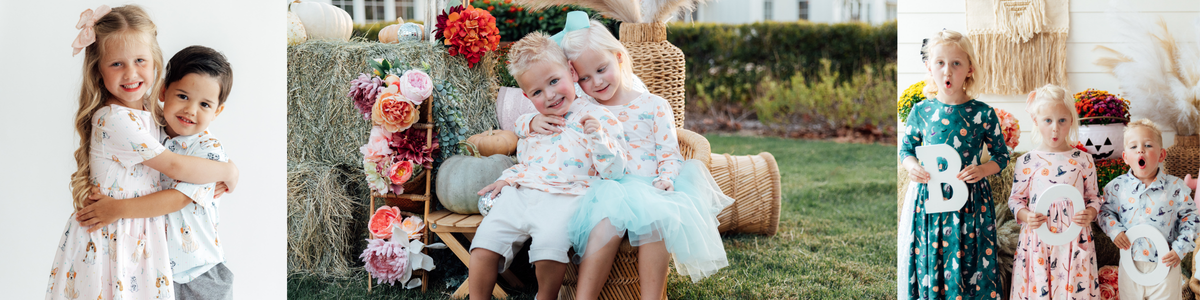 Children wearing matching seasonal outfits with festive pumpkin and dog prints in a cozy, coordinated style.