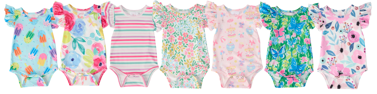 A row of baby bodysuits featuring flutter sleeves and colorful patterns including florals, stripes, butterflies, and treats.