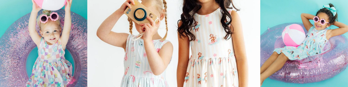 Young girls wearing playful, patterned tank twirl dresses with summer-themed prints and vibrant colors.