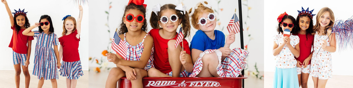 Three smiling girls in red, white, and blue 4th of July outfits, accessories, and festive party decorations.
