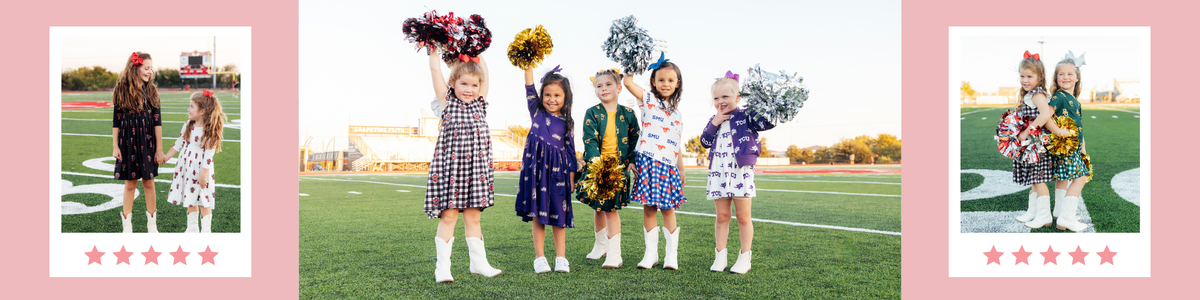 Five young girls in spirited collegiate dresses and jackets holding pom-poms on a football field for game day.