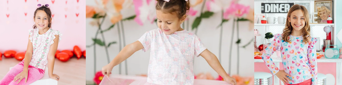 Girls wearing stylish tops featuring floral prints, pastel colors, and playful heart patterns in a cheerful setting.