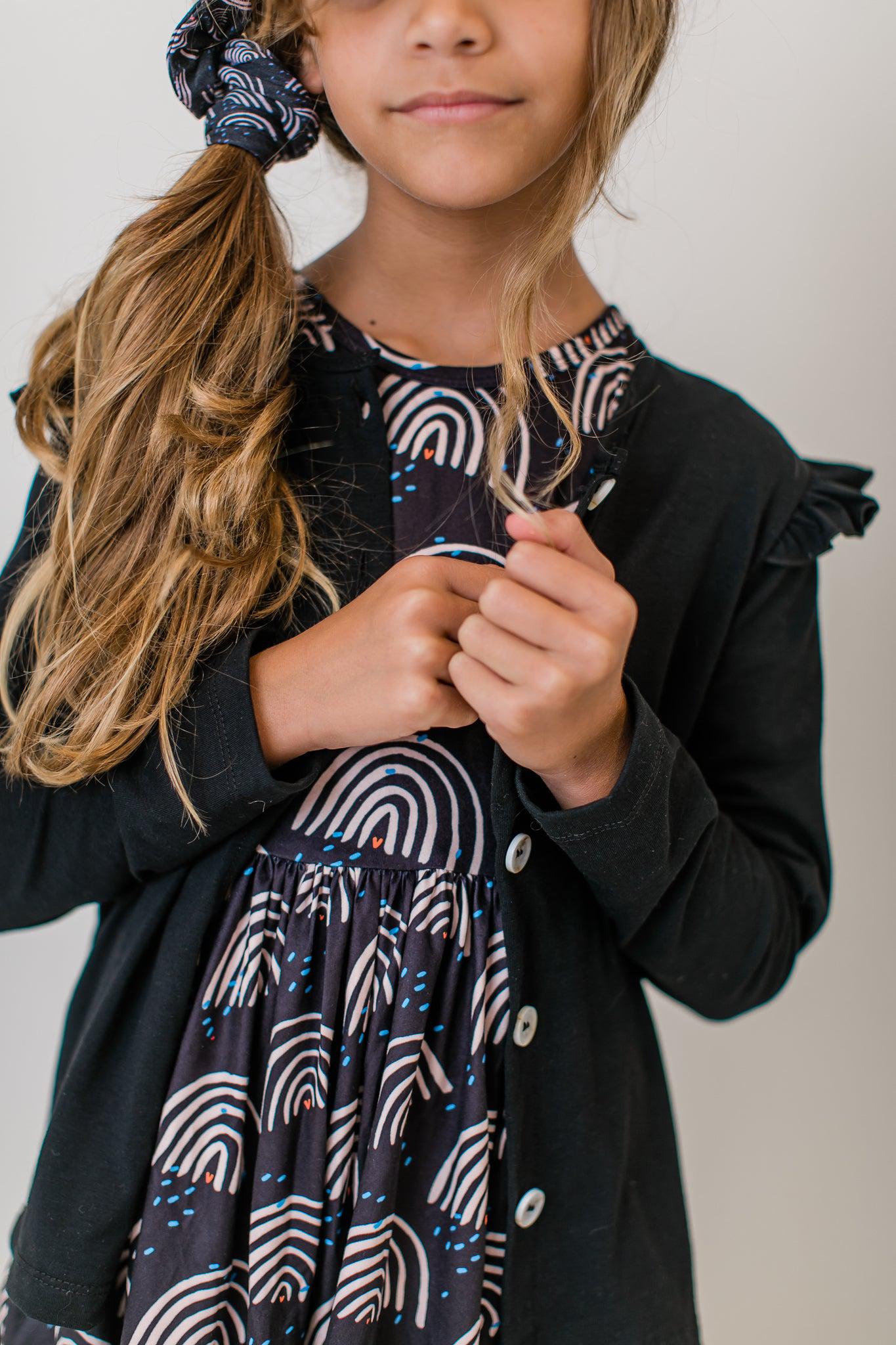black dress brown cardigan New favorite cardigan. Chocolate brown sweaters are everywhere this fall. I love it paired with a simple black tank, black pants, and a pair of white pumps just to break it up a little. An easy