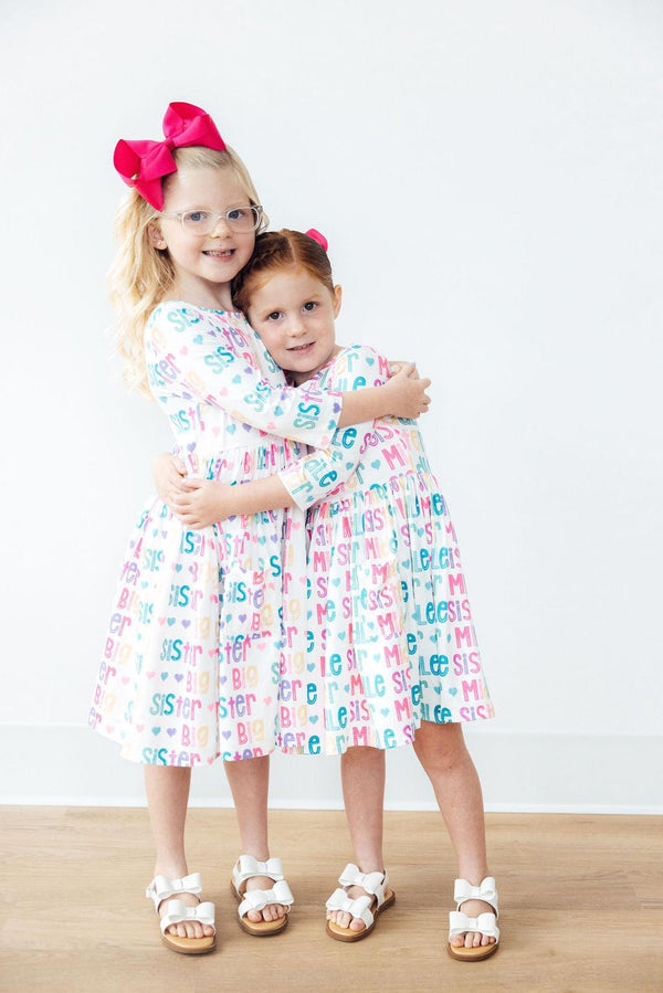 matching sister dresses Like the same, but different! , Coordinating sister matching moments= top of our favorites list! , Whether its fall twirl dresses, sweaters, or velvet bells, we are all about that twinning vibe!