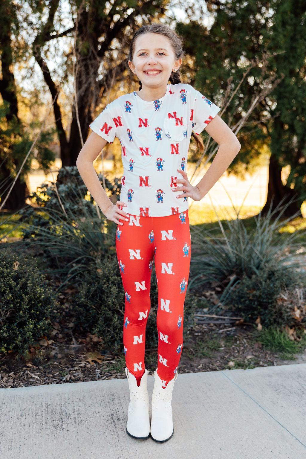 (S) Nebraska White Herbie Husker Ruffle Pocket Tee-Mila & Rose ®
