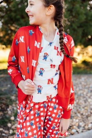 (S) Nebraska White Herbie Husker Ruffle Pocket Tee-Mila & Rose ®