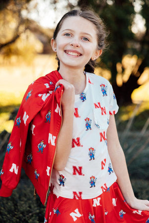 (S) Nebraska White Herbie Husker Ruffle Pocket Tee-Mila & Rose ®