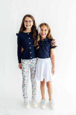 Navy S/S Ruffle Polo-Mila & Rose ®