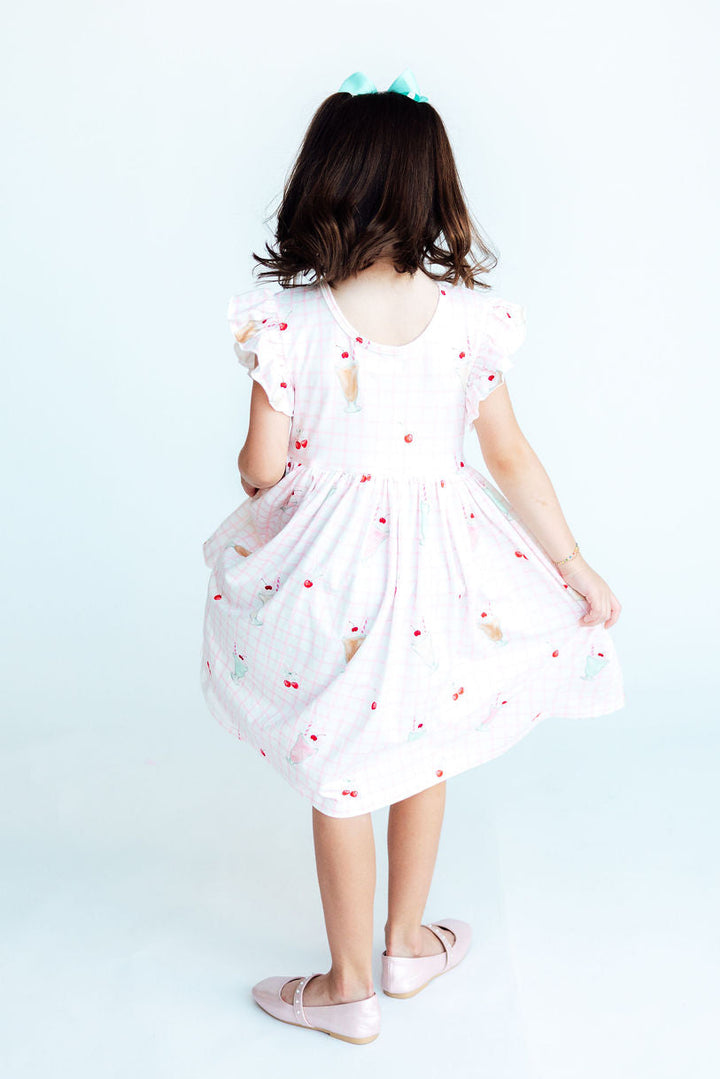 Sweet Sips Flutter Sleeve Twirl Dress