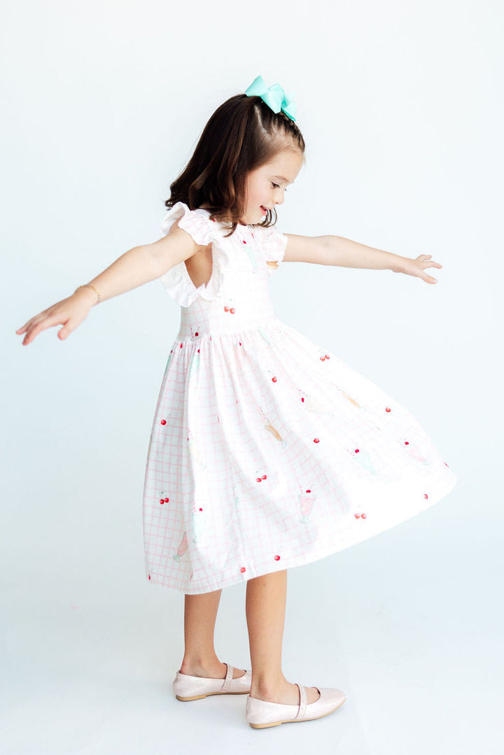 Sweet Sips Flutter Sleeve Twirl Dress