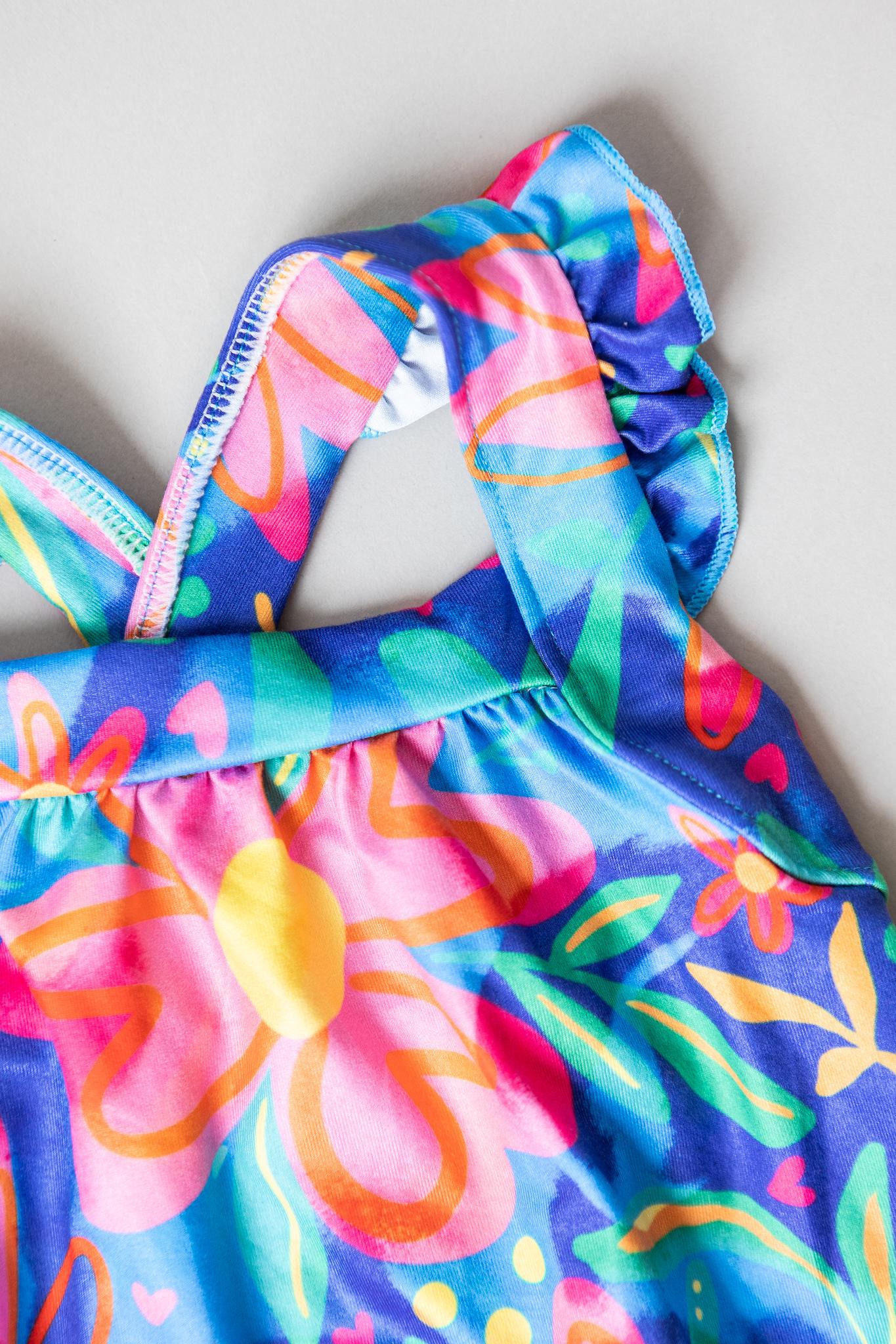 Springing Around Ruffle Cross Back Romper-Mila & Rose ®